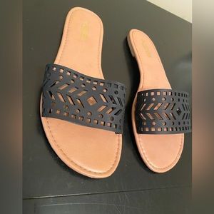 X2B black leather slides
